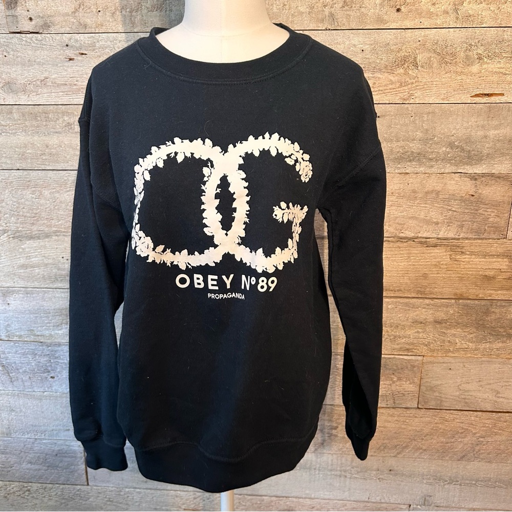 Obey women's black crewneck sweatshirt in size small
